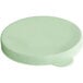 A green circular Choice lid with holes.