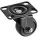 A Galaxy black swivel caster with a black wheel and round metal frame.