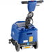 A blue Clarke Vantage walk behind floor scrubber with a black handle and wheels.