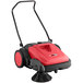 A red and black Viper PS480 manual push sweeper.