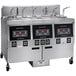 A black and grey Henny Penny electric fryer with Computron 1000 controls panel with buttons and numbers.