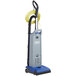 A blue and grey Clarke CarpetMaster upright vacuum cleaner with a hose.