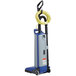 A blue and white Clarke CarpetMaster 112 upright vacuum cleaner with a yellow cord and tube.