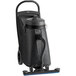 A black Clarke Summit Pro wet/dry vacuum with a blue handle and hose.
