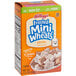 A white Kellogg's Frosted Mini-Wheats cereal box.