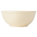 A butter yellow Cal-Mil melamine bowl with a white background.
