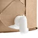 A white cylinder of Betco Untouchable 5 Gallon Bag in Box Floor Finish in a cardboard box.