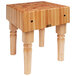 A John Boos maple butcher block table with legs.