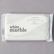 A white package of Dial White Marble Deodorant Bar Soap with black text.