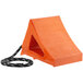 An orange triangle-shaped plastic wheel chock with an eye hook and black rope.