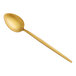 An Acopa Odin gold stainless steel teaspoon with a long handle.