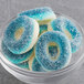 A bowl of blue and white Kervan Gummy Blue Raspberry Rings.