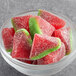 A bowl of Kervan sour gummy watermelon slices.