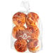 A close up of a plastic bag of Turano Tomato and Basil Focaccina Rolls with a label.