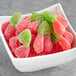 A bowl of Kervan Sour Gummy Cherries.