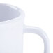 A close up of a GET Diamond White plastic mug with a handle.