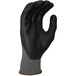 A black Cordova Conquest glove with a gray palm.