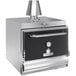 A black and silver Mibrasa worktop charcoal oven with a door.