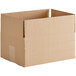 A Kraft cardboard shipping box with a cut out handle.
