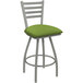 A Holland Bar Stool Jackie ladderback swivel counter stool with a green padded seat on a white frame.