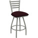 A Holland Bar Stool ladderback counter stool with a maroon cushion and gray frame.