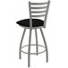 A Holland Bar Stool black and silver Ladderback swivel bar stool with a black cushion.