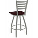A Holland Bar Stool Jackie Ladderback Swivel Counter Stool with a dark cherry oak seat and anodized nickel frame.