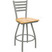 A Holland Bar Stool Jackie Ladderback Swivel Bar Stool with a natural maple seat.