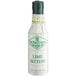 A white bottle of Fee Brothers Lime Bitters with a green logo.