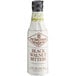 A white bottle of Fee Brothers Black Walnut Bitters with brown text.