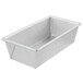 A silver Chicago Metallic bread loaf pan on a white counter.