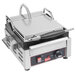 A Cecilware single panini sandwich grill with flat grill surfaces.