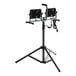 A white Genesis adjustable tripod stand with two dual-head LED work lights on it.