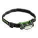 A black and green PowerSmith headlamp with a green light on.