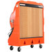 An orange and black Portacool evaporative cooler on wheels.