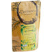 A brown bag of Davidson's Organic Oothu Black Flowery Orange Pekoe Loose Leaf Tea with green leaves and a black circle.