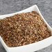 A bowl of Davidson's Organic Tulsi Mango Peach Herbal loose leaf tea.