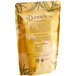 A brown bag of Davidson's Organic French Vanilla Essence Loose Leaf Tea with text and leaves on it.