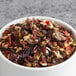 A bowl of Davidson's Organic Cranberry Orange Herbal Loose Leaf Tea.