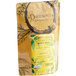 A yellow package of Davidson's Organic Jasmine Pearls Loose Leaf Tea on a counter.