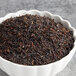A bowl of Davidson's Organic Earl Grey loose leaf tea.