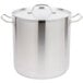 A large stainless steel Vollrath stock pot with handles and a lid.
