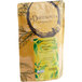 A brown bag of Davidson's Organic Dunsandle Nilgiri loose leaf tea with green and yellow text.