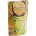 A brown bag of Davidson's Organic Orange Spice Loose Leaf Tea with green leaves on the label.
