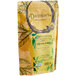 A bag of Davidson's Organic Mezclado de Mate Herbal Loose Leaf Tea with a label and green leaves.