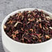 A bowl of Davidson's Organic Te De Hibiscus loose leaf tea.