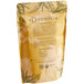 A brown bag of Davidson's Organic Moroccan Green with Mint Loose Leaf Tea with text and leaves.