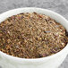 A bowl of Davidson's Organic Tulsi Hibiscus Flower herbal loose leaf tea.