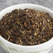 A bowl of Davidson's Organic Earl of Grey Green loose leaf tea.