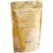 A brown bag of Davidson's Organic Orange Spice Herbal Loose Leaf Tea with text and leaves on it.